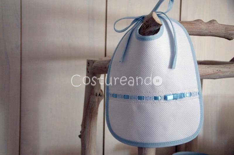 PIQUE BIB WITH EMBROIDERY & RIBBON